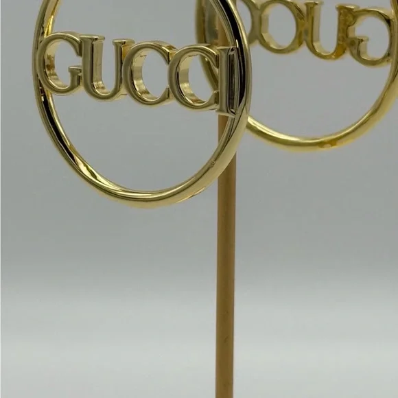 Gold Classic Logo Hoop Earrings - Picture 1 of 3